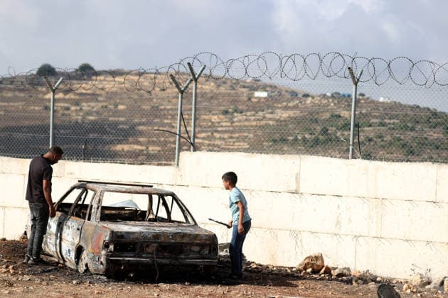 Nahostkonflikt, Westjordanland, Ausgebrannte Autos nach Siedlerangriff in Ramallah