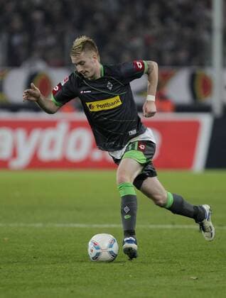 Fussball-Bundesliga Saison 2011 2012-15. Spieltag 1.FC Köln-VFL Borussia Mönchengladbach 0-3 im Rhein-Energie-Stadion in Köln am 25.11.2011 Marco Reus (Borussia Mönchengladbach ) Fussball,Herren,Männer,Liga,Bundesliga,DFL,Aktion,Ganzkörper,Einzelbild, Freisteller, Ball,Mimik,hoch