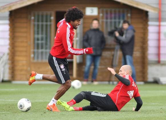 19.03.2014,FC Bayern Training, Saebenerstrasse,Muenchen, Fussball,Sport,im Dante vs Arjen Robben EP_prz