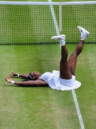 Tennis - 2016 Wimbledon Championships - Week Two, (Day Thirteen) Ladies Singles Final Serena Williams (USA) Angelique Kerber (GER) Serena Williams falls to the ground after winning match point on Centre court COLORSPORT ANDREW COWIE 