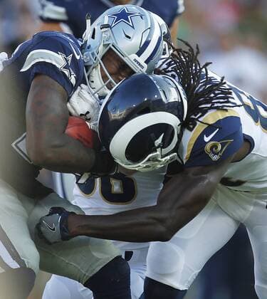August 12, 2017 - Los Angeles, CA, USA - LOS ANGELES, CA - AUGUST 12, 2017 - Dallas Cowboys Lance Lenior is hit by Los Angeles Rams Temarrick Hemingway on a kick return in the first quarter at the Los Angeles Memorial Coliseum. NFL American Football Herren USA Preseason 2017: Rams 13:10 Cowboys - ZUMAs44_ 20170812_zaf_s44_019 Copyright: xK.C.xAlfredx