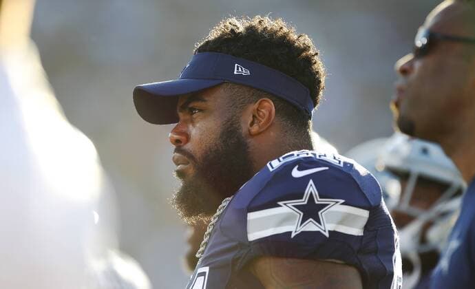 August 12, 2017 - Los Angeles, CA, USA - LOS ANGELES, CA - AUGUST 12, 2017 - Dallas Cowboys Ezekiel Elliott looks on during a game against the Los Angeles Rams at the Los Angeles Memorial Coliseum. Elliott was recently suspended for six games. NFL American Football Herren USA Preseason 2017: Rams 13:10 Cowboys - ZUMAs44_ 20170812_zaf_s44_031 Copyright: xK.C.xAlfredx