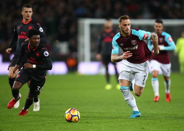 December 13, 2017 - London, United Kingdom - L-R Arsenal s Ainsley Maitland-Niles and West Ham United s Marko Arnautovic.during Premier League match between West Ham United against Arsenal at The London Stadium, Queen Elizabeth II Olympic Park, London, Britain - 13 Dec 2017 West Ham United v Arsenal - Premier League  - ZUMAn230 20171213_zaa_n230_534 Copyright: xKieranxGalvinx