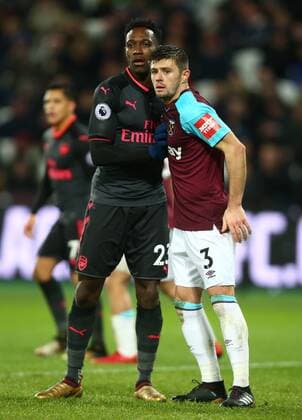 December 13, 2017 - London, United Kingdom - L-R Arsenal s Danny Welbeck and West Ham United s Aaron Cresswell in action during Premier League match between West Ham United against Arsenal at The London Stadium, Queen Elizabeth II Olympic Park, London, Britain - 13 Dec 2017 West Ham United v Arsenal - Premier League  - ZUMAn230 20171213_zaa_n230_558 Copyright: xKieranxGalvinx
