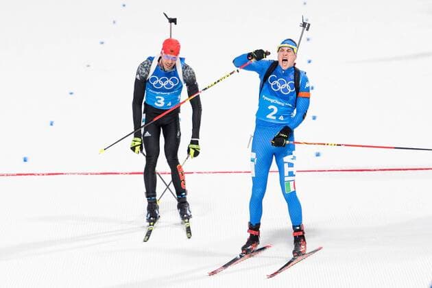 Themen der Woche - SPORT Olympia-Bilder des Tages - SPORT 180220 Arnd Peiffer of Germany and Dominik Windisch of Italy at the finish line after the Biathlon Mixed Relay during day eleven of the 2018 Winter Olympics on February 20, 2018 in Pyeongchang. Photo: Carl Sandin BILDBYRAN kod CS 57999_309 Copyright: CARLxSANDIN BB180220CS107