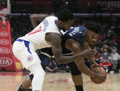 November 5, 2018 - Los Angeles, California, U.S - Patrick Beverley 21 of the Los Angeles Clippers defends against Jimmy Butler 23 of the Minnesota Timberwolves during their NBA Basketball Herren USA game on Monday November 5, 2018 at the Staples Center in Los Angeles, California. Clippers defeat Timberwolves, 120-109. Clippers defeat Timberwolves, 120-109 - ZUMAp124 20181105_zaa_p124_016 Copyright: xJavierxRojasx