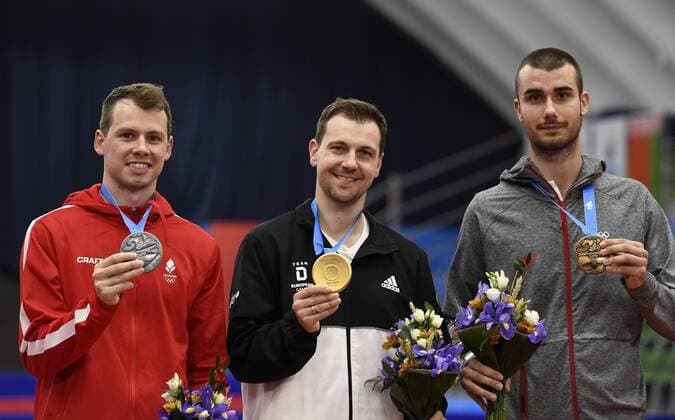 Sport Themen der Woche KW26 Sport Bilder des Tages DK: 20190626, Minsk, Hviderusland. Europaspiele Minsk 2019. Bordtennis finale herresingle Jonathan Groth, Danmark Denmark DEN vs Timo Boll Tyskland Germany GER. Timo Boll vinder guld, Jonathan Groth vinder soelv og Pucar .Tomislav fra Kroatien vinder bronze Foto: Lars Moeller UK: 20190626, Minsk, Belarus. European Games Minsk 2019. Photo: Lars Moeller , Minsk Hviderusland Copyright: ©LarsxMoeller LarsxMoellerx cop101 spdk20190626-202205-L