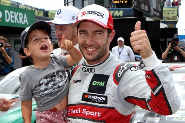 Sport Bilder des Tages Mike Rockenfeller (GER) (Audi Team Phoenix - Audi RS5 DTM) freut sich über seinen Sieg beim DTM-Lauf auf dem TT Circuit Assen (NL). Copyright Thomas Pakusch