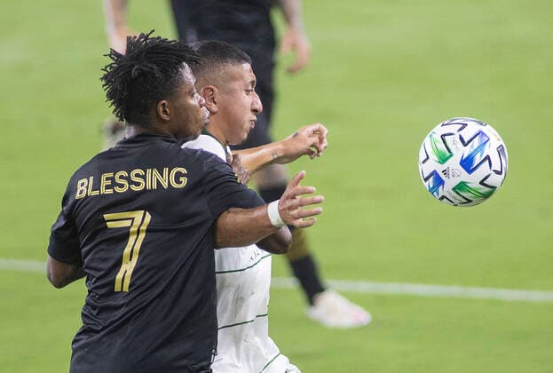 September 13, 2020, Los Angeles, California, USA: Latif Blessing 7 of the LAFC is challenged by Marvin Loria 44 of the Portland Timbers during their MLS, Fussball Herren, USA game on Sunday September 13, 2020 at the Banc of California Stadium in Los Angeles, California. LAFC defeats Timbers, 4-2. JAVIER ROJAS PI Los Angeles USA - ZUMAp124 20200913_zaa_p124_055 Copyright: xJavierxRojasx