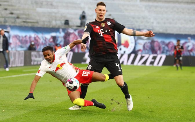 RB Leipzig - FC Bayern 03.04.2021 Leipzig, 03.04.2021, Red Bull Arena, Fussball, Bundesliga, 27.Spieltag , RB Leipzig vs. FC Bayern München , Im Bild v.l.: Christopher Nkunku (18, RB Leipzig), Niklas Süle Suele (4, Bayern). , DFL regulations prohibit any use of photographs as image sequences and or quasi-video. ,