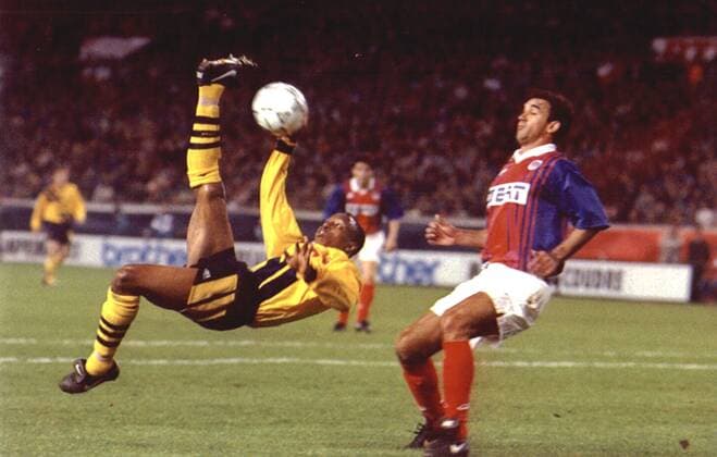 Mandatory Credit: Photo by Ted Blackbrow ANL Shutterstock (1329154a) Football European Cup Winners Cup Semi-final 1993-1994. Paris St. Germain V Arsenal 1-1. Ian Wright Tries For A Goal. Football European Cup Winners Cup Semi-final 1993-1994. Paris St. Germain V Arsenal 1-1. Ian Wright Tries For A Goal. EDITORIAL USE ONLY No use with unauthorised audio, video, data, fixture lists (outside the EU), club league logos or live services. Online in-match use limited to 45 images (+15 in extra time). No use to emulate moving images. No use in betting, games or single club league player publications services. Football European Cup Winners Cup Semi-final 1993-1994. Paris St. Germain V Arsenal 1-1. Ian Wright Tries For A Goal. EDITORIAL USE ONLY No use with unauthorised audio, video, data, fixture lists (outside the EU), club league logos or live services. Online in-match use limited to 45 images (+15 in extra time). No use to emulate moving images. No use in betting, games or Copyright: xTedxBlackbrow ANL Shutterstockx 1329154a