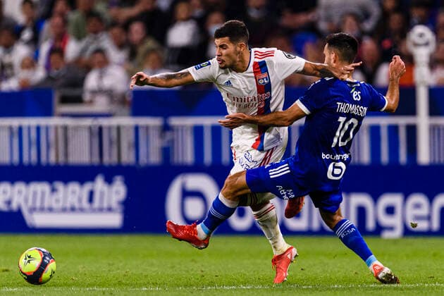 LYON, FRANCE - SEPTEMBER 12: Bruno Guimaraes of Olympique Lyon (L) fights for the ball with Adrien Thomasson of Racing Strasbourg (R) during the warming up ahead Ligue 1 Uber Eats match between Lyon and Strasbourg at Groupama Stadium on September 12, 2021 in Lyon, France. Lyon France Copyright: xJustPictures.ch MarcioxMachadox