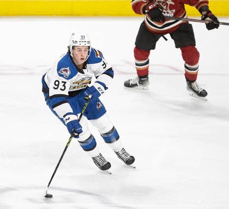 December 4, 2021, Loveland, Colorado, U.S: Eagles C JEAN-LUC FOUDY skates the puck into the Roadrunners goal mouth Saturday night at the Budweiser Events Center. The Eagles beat the Roadrunners 4-0. Loveland U.S. - ZUMAav4_ 20211204_zaf_av4_008 Copyright: xHectorxAcevedox