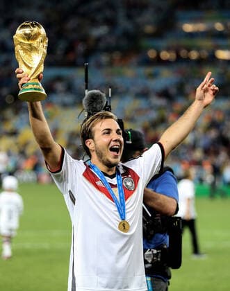 Football - 2014 FIFA World Cup, WM, Weltmeisterschaft, Fussball - Final - Germany v Argentina 13 July 2014 - FIFA World Cup - Final - Germany v Argentina - Mario Gotze of Germany celebrates with the world cup - Photo: Marc Atkins Offside. Rio de Janeiro Brazil Copyright: xMarcxAtkinsxOffside