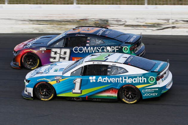 CHARLOTTE, NC - MAY 29: Ross Chastain ( 1 TrackHouse Racing Advent Health Chevrolet) races with Daniel Suarez ( 99 TrackHouse Racing CommScope Chevrolet) during the running of the NASCAR, Motorsport, USA Cup Series Coca-Cola 600 on May 29, 2022 at Charlotte Motor Speedway in Charlotte, NC. (Photo by Jeff Robinson Icon Sportswire) AUTO: MAY 29 NASCAR Cup Series Coca-Cola 600 Icon2205292048600