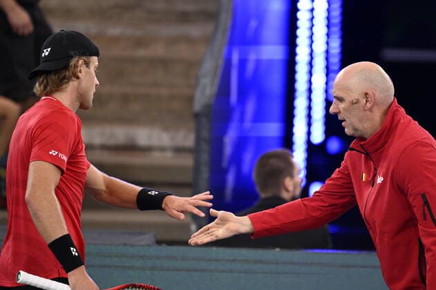 Belgian Zizou Bergs and Belgian captain Johan Van Herck pictured during the game between Belgian Bergs and Australian Kubler, the first game between the Belgian team and Australia, in Group C of the group stage of the 2022 Davis Cup finals, Tuesday 13 September 2022, in Hamburg, Germany. Belgium will compete from 13 to 18 September against Australia, Germany and France in Group C. LAURIExDIEFFEMBACQ  x44127122x