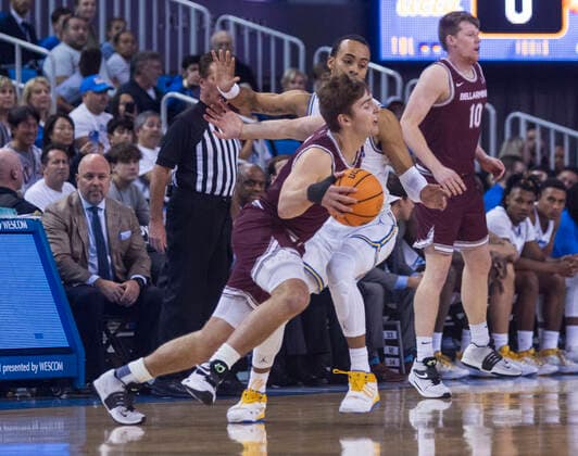 November 27, 2022, Los Angeles, California, USA: Peter Suder 5 of the Bellarmine Knights tries to get past Abramo Canka 1 of the UCLA Bruins during their NCAA, College League, USA basketball game on Sunday November 27, 2022 at Pauley Pavilion in Westwood, California. Bruins defeat Knights, 81-60. PI Los Angeles USA - ZUMAp124 20221127_zaa_p124_029 Copyright: xJAVIERxROJASx