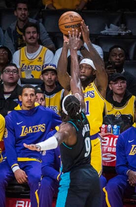 November 30, 2022, Los Angeles, California, USA: Patrick Beverly 21 of the Los Angeles Lakers puts a shot over Jerami Grant 9 of the Portland Trail Blazers during their NBA, Basketball Herren, USA game on Wednesday November 30, 2022 at Crypto.com Arena in Los Angeles, California. Lakers defeat Trail Blazers, 128-109. PI Los Angeles USA - ZUMAp124 20221130_zaa_p124_006 Copyright: xJAVIERxROJASx