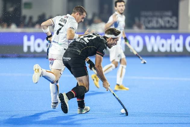 Bilder des Jahres 2023, Sport 01 Januar Feldhockey WM, Finale, Deutschalnd - Belgien BHUBANESWAR - Marco Miltkau of Germany (r) against John John Dohmen of Belgium during the final of the Hockey World Cup in India. ANP WILLEM VERNES netherlands out - belgium out Bhubaneswar xVIxxIVx