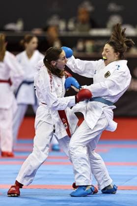 Bilder des Jahres 2023, Sport 10 Oktober Sport Themen der Woche KW43 Sport Bilder des Tages Madeleine Schröter, GER (blue), and an Ukrainian player (unknown due to unprofessional organisation) during female s team kumite at 2023 karate world championships in Budapest; 26 10 2023;