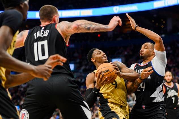 Bilder des Jahres 2024, Sport 01 Januar Sport Themen der Woche KW04 Sport Bilder des Tages January 26, 2024, Toronto, On, CANADA: Toronto Raptors guard RJ Barrett (9) goes to the basket while defended by Los Angeles Clippers guard Norman Powell (24) and centre Daniel Theis (10) during second half NBA, Basketball Herren, USA basketball action, in Toronto on Friday, January 26, 2024. Canada News - January 26, 2024 - ZUMAc35_ 20240126_zaf_c35_119 Copyright: xChristopherxKatsarovx