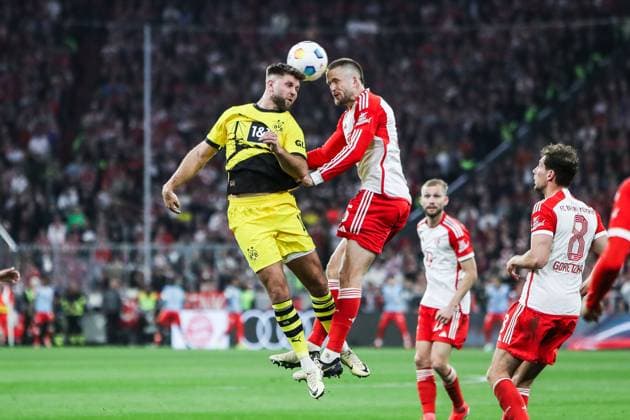 Bilder des Jahres 2024, Sport 03 März Sport Themen der Woche KW13 Fussball, Bundesliga Saison 2023 24 27.Spieltag FC Bayern München - Borussia Dortmund 30.03.2024, Allianz Arena Niclas Füllkrug (Borussia Dortmund, 14) Eric Dier (FC Bayern München, 15) München Allianz Arena Bayern Deutschland