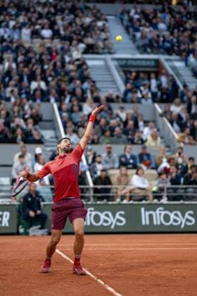 (240529) -- PARIS, May 29, 2024 -- Novak Djokovic hits a return during the men s singles first round match between Novak Djokovic of Serbia and Pierre-Hugues Herbert of France at the French tennis tournament at Roland Garros in Paris, France, on May 28, 2024. ) (SP)FRANCE-PARIS-TENNIS-FRENCH OPEN-MEN S SINGLES MengxDingbo