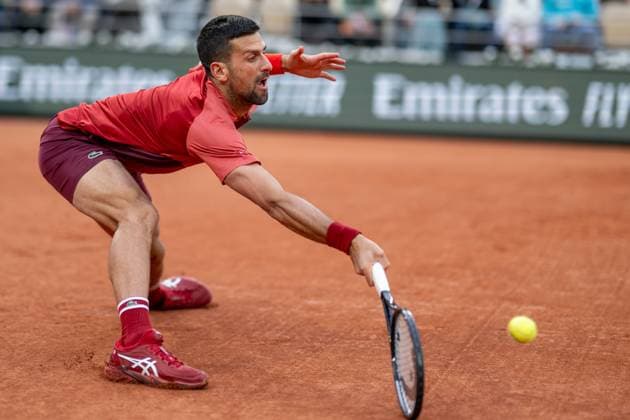 (240529) -- PARIS, May 29, 2024 -- Novak Djokovic hits a return during the men s singles first round match between Novak Djokovic of Serbia and Pierre-Hugues Herbert of France at the French tennis tournament at Roland Garros in Paris, France, on May 28, 2024. ) (SP)FRANCE-PARIS-TENNIS-FRENCH OPEN-MEN S SINGLES MengxDingbo