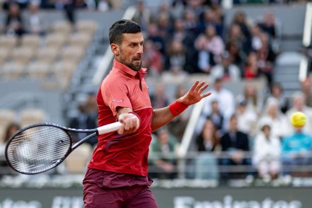 (240529) -- PARIS, May 29, 2024 -- Novak Djokovic hits a return during the men s singles first round match between Novak Djokovic of Serbia and Pierre-Hugues Herbert of France at the French tennis tournament at Roland Garros in Paris, France, on May 28, 2024. ) (SP)FRANCE-PARIS-TENNIS-FRENCH OPEN-MEN S SINGLES MengxDingbo