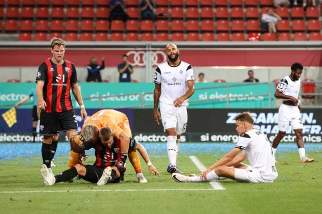 3. Liga; FC Ingolstadt - SV Waldhof Mannheim; 04.08.2024 Marius FUNK (FCI 1) und Yannick DEICHMANN (FCI 20) freuen sich ueber die starke Rettungsaktion Terrence BOYD (Waldhof 13) ist enttaeuscht Copyright: xBEAUTIFULxSPORTS Goldbergx