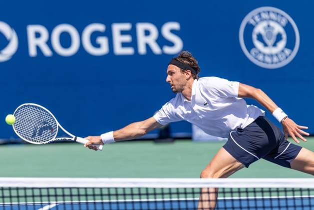 August 10, 2024, Montreal, Quebec, Canada: ARTHUR RINDERKNECH from France stretched to reach the ball against Flavio Cobolli from Italia in second set in second round of Canadian Open at IGA Stadium in Montreal, Quebec, Canada Montreal Canada - ZUMAl189 20240810_zsp_l189_004 Copyright: xYannickxLegarex