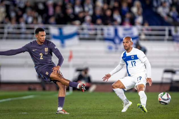 Trent Alexander-Arnold of England and Nikolai Alho of Finland during the UEFA Nations League Group B2 match between Finland and England at the Helsinki Olympic Stadium 13. October 2024 in Helsinki, Finland. (Mauri Forsblom Newspix24)  Copyright: xKallexParkkinenx NP24_02812371
