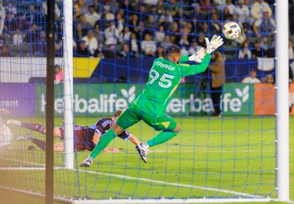 October 26, 2024, Los Angeles, California, USA: Goalkeeper, Zackary Steffan 95 of the Colorado Rapids blocks the ball during the Audi 2024 MLS, Fussball Herren, USA Cup Playoffs Round One Game 1 of 3 against the LA Galaxy on Saturday October 26, 2024 at Dignity Health Sports Park Stadium in Carson, California. The Galaxy defeats Rapids, 5-0. JAVIER ROJAS PI Los Angeles USA - ZUMAp124 20241026_zaa_p124_062 Copyright: xJavierxRojasx