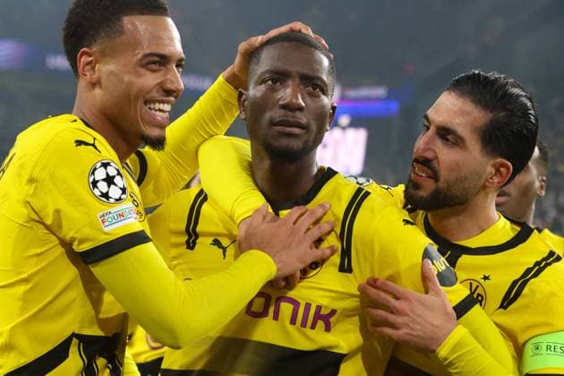 Bilder des Jahres 2024, Sport 12 Dezember Sport Themen der Woche KW50 Sport Bilder des Tages Dortmund, Deutschland 11. Dezember 2024: Champions League - 2024 2025 - Borussia Dortmund vs. FC Barcelona, Barca Im Bild: v.li. der Zweite Torschütze Serhou Guirassy (BVB) jubelt nach seinem Tor zum 1:1 mit Emre Can (BVB), rechts im Bild, und Felix Nmecha (BVB), links im Bild Signal Iduna Park Nordrhein Westfalen Copyright: xFotostandx xFantinix