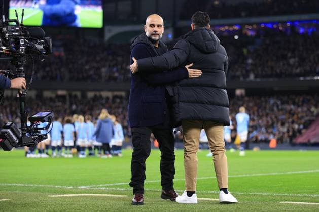 Manchester City v Manchester United, ManU 15 December 2024 - Premier League - Manchester City v Manchester United - Manchester City manager Pep Guardiola embraces Manchester United manager Ruben Amorim - Photo: Simon Stacpoole Offside. Manchester UK Copyright: xSimonxStacpoolexOffside