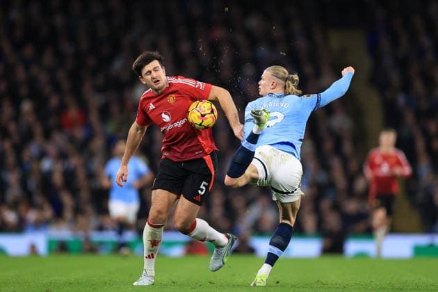 Manchester City v Manchester United, ManU 15 December 2024 - Premier League - Manchester City v Manchester United - Harry Maguire of Manchester United and Erling Haaland of Manchester City compete for the ball - Photo: Simon Stacpoole Offside. Manchester UK Copyright: xSimonxStacpoolexOffside