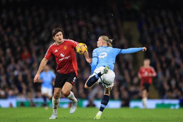 Manchester City v Manchester United, ManU 15 December 2024 - Premier League - Manchester City v Manchester United - Harry Maguire of Manchester United and Erling Haaland of Manchester City compete for the ball - Photo: Simon Stacpoole Offside. Manchester UK Copyright: xSimonxStacpoolexOffside