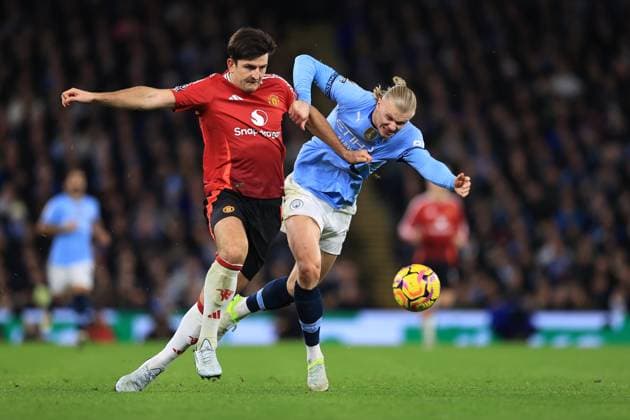 Manchester City v Manchester United, ManU 15 December 2024 - Premier League - Manchester City v Manchester United - Harry Maguire of Manchester United and Erling Haaland of Manchester City compete for the ball - Photo: Simon Stacpoole Offside. Manchester UK Copyright: xSimonxStacpoolexOffside