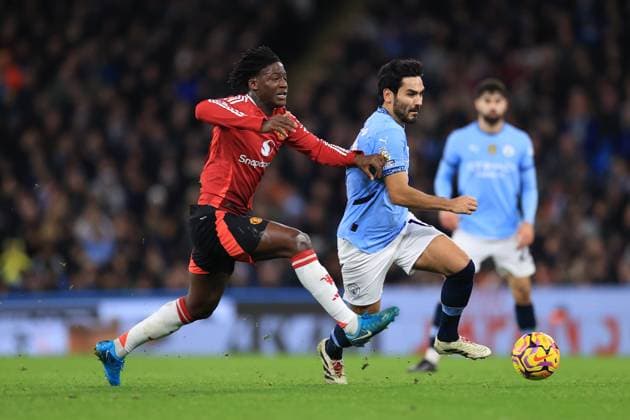 Manchester City v Manchester United, ManU 15 December 2024 - Premier League - Manchester City v Manchester United - Kobbie Mainoo of Manchester United and Ä°lkay Gundogan of Manchester City - Photo: Simon Stacpoole Offside. Manchester UK Copyright: xSimonxStacpoolexOffside