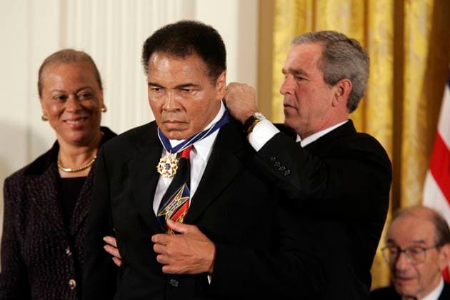 Obituary for Muhammad Ali President George W. Bush presents boxing legend Muhammad Ali the Presidential Medal of Freedom during a ceremony at the White House in Washington, D.C., on November 9, 2005. Ali died on Friday, June 3, 2016, at 74. (Chuck Kennedy MCT TNS) Washington DC USA EDITORIAL USE ONLY Copyright: xx 1185712 ChuckxKennedyx krtphotoslive754862