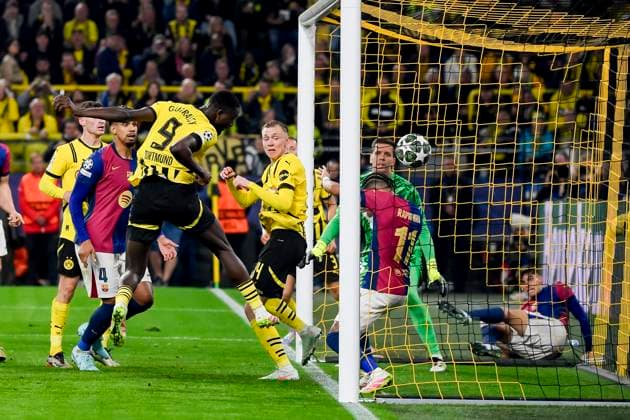 Bilder des Jahres 2025, Sport 04 April Sport Bilder des Tages Serhou Guirassy (Borussia Dortmund) scores his team s second goal during the UEFA Champions League 2024 25 Quarter Final Second Leg match between Borussia Dortmund and FC Barcelona, Barca at BVB Stadion Dortmund on April 15, 2025 in Dortmund, Germany. (Photo by Max Maiwald DeFodi Images)