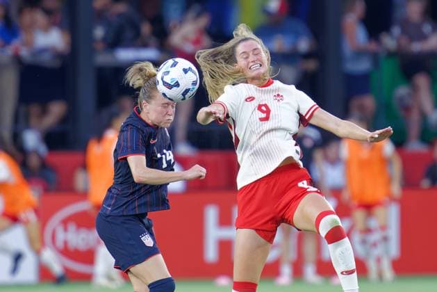 July 2, 2025, Washington, District of Columbia, USA: Jordyn Huitema 9 of Canada and Emily Sonnett 14 of the United States battle to head inbound ball during the US Woman™s national team, Nationalteam vs. Canada match at Audi Field. The USA won 3-0. Washington USA - ZUMA 20250702_mda_s363_155 Copyright: xJeffxScudderx