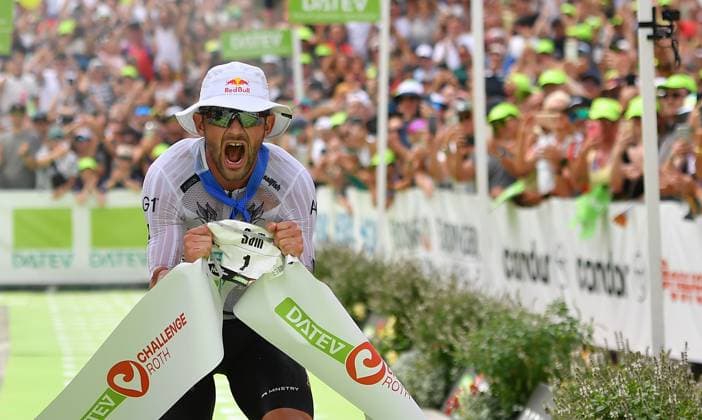 06.07.2025 -Triathlon - 2025 - DATEV Challenge Roth 2025 - Sportfoto Zink OGo - xogox - Zieleinlauf 1 Platz (Zeit: 07:29:35) Laidlow Sam (FRA) ()