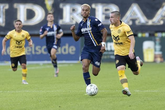 KERKRADE , 15-08-2025 , Parkstad Limburg Stadium , season 2025 2026 , Dutch Keuken Kampioen Divisie football , match between Roda JC and De Graafschap , Picture shows Jevon Simons of De Graafschap and Tim Köther of Roda JC Roda JC - De Graafschap  x30511185x Copyright:
