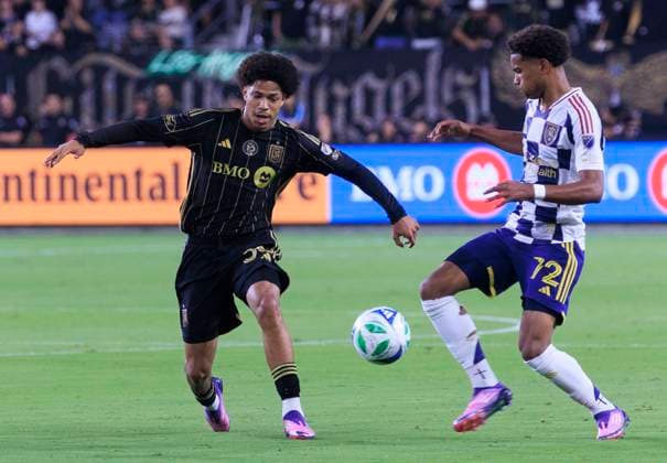 September 21, 2025, Los Angeles, California, USA: David Martinez 30 of the Los Angeles Football Club attempts to steal the ball from Rwan Cruz 12 of Real Salt Lake during their regular season MLS, Fussball Herren, USA game on Sunday September 21, 2025 at the BMO Stadium in Los Angeles, California. LAFC defeat RSL, 4-1. ARIANA RUIZ PI Los Angeles USA - ZUMAp124 20250921_zaa_p124_038 Copyright: xArianaxRuizx