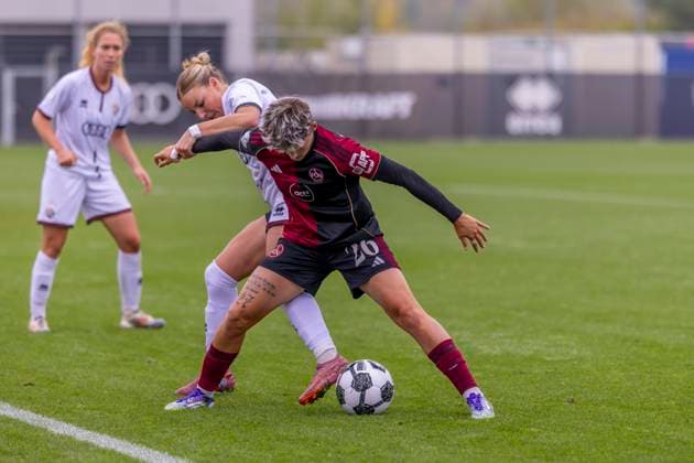 Ingolstadt, Deutschland 28. September 2025: DFB Pokal Frauen - 2025 2026 - FC Ingolstadt 04 vs. 1. FC Nürnberg Im Bild: v. li. im Zweikampf Lea Wolski (FCI) und Aneta Polaskova (FCN) DFB regulations prohibit any use of photographs as image sequences and or quasi-video. MTV-Stadion Bayern Copyright: xFotostandx xSchäferx