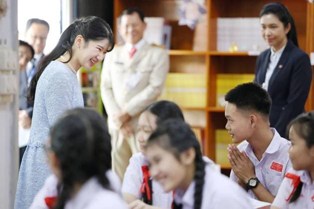 Japan Princess Aiko in Laos Japanese Princess Aiko (L) chats with students during Japanese language class at a school in Vientiane on Nov. 19, 2025. The princess is making an official trip to Laos. (Pool photo)  A14AA0005045666P
