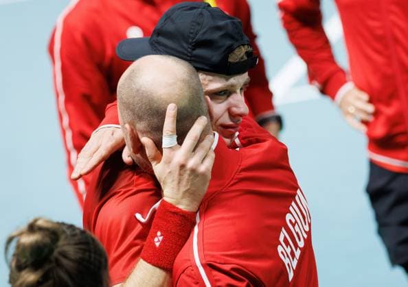 Belgian Zizou Bergs and Belgian captain Steve Darcis look dejected after Bergs lost a tennis match against Italian Cobolli, the second in the Davis Cup semifinals between Belgium and Italy, in Bologna, Italy, on Friday 21 November 2025. The Davis Cup top eight Finals take place in Bologna from November 18 to 23. BENOITxDOPPAGNE  x143303294x