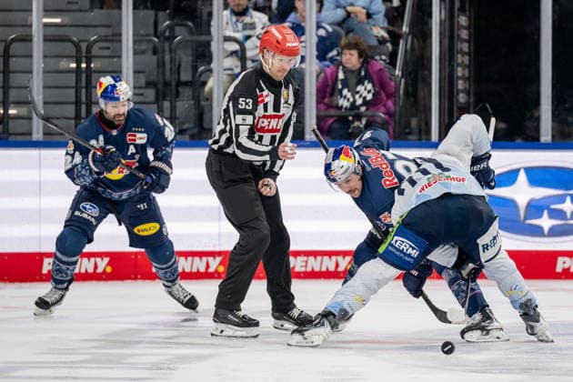 Linesperson Joshua Roemer fuehrt ein Bully Faceoff aus zwischen Gabriel Fontaine (EHC Red Bull Muenchen, 97) und Justin Scott (Straubing Tigers, 20) GER, EHC Red Bull Muenchen vs. Straubing Tigers, Eishockey, DEL, 22. Spieltag, Saison 2025 2026, 25.11.2025. GER, EHC Red Bull Muenchen vs. Straubing Tigers, Eishockey, DEL, 22. Spieltag, Saison 2025 2026, 25.11.2025. Muenchen Copyright: xEibner-Pressefoto HeikexFeinerx EP_HFR