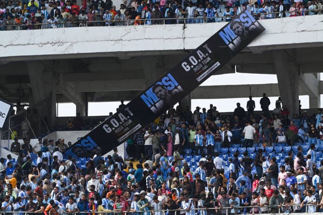 KOLKATA, INDIA - DECEMBER 13: Angry fans vandalise banners, throw bottles, ripped up seats and threw them on the pitch after Argentina football star Lionel Messi s early departure from the Salt Lake Stadium during his India Tour, on December 13, 2025 in Kolkata, India. Football fans were angry that, despite buying tickets at steep prices, they were not even able to catch a glimpse of their favourite star. Lionel Messi is on his G.O.A.T. India tour 2025, and he arrived in Kolkata in the early hours of Saturday (December 13, 2025). (Photo by Samir Jana Hindustan Times ) Argentina Football Star Lionel Messi Visits Kolkata: Upset Fans Vandalise Salt Lake Stadium
